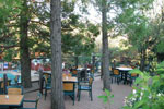 The "5 Cedars Deck" serves to host Sunday brunch and events overlooking the pool area.